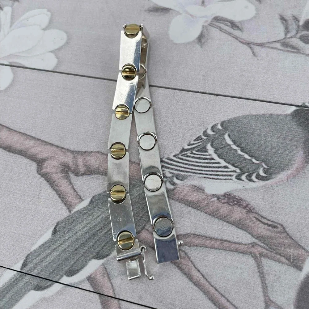 Elegant Silver and Gold Bracelet